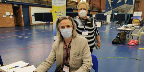 Wits Hero Scott Smalley (front) and Mande Toubkin from Netcare were in charge of the Wits vaccination site’s operations. Pic credit - Wits Vuvuzela